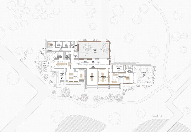 Floor plan drawing showing interconnected volumes arranged around courtyards with scattered trees