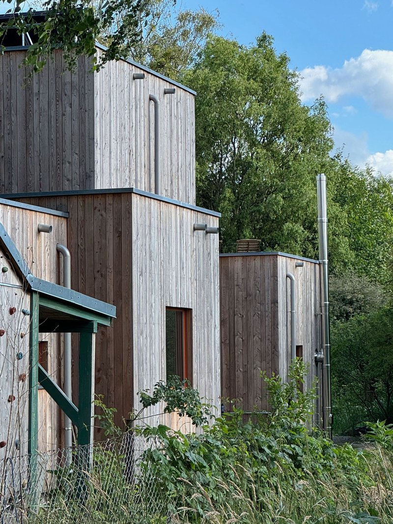 ANNABAU Scatters Five Timber Towers Across a Wooded Plot in Brandenburg