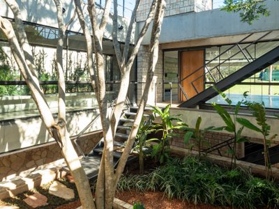 OMCM arquitectos Builds a Summer House in Paraguay from Quarry Waste Blocks and Three Sacred Trees