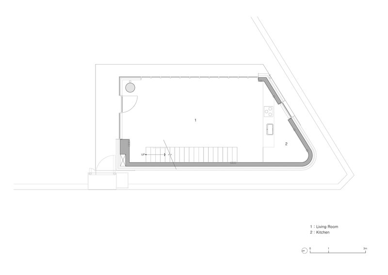 Ground floor plan drawing showing living room and kitchen within an angled trapezoidal footprint