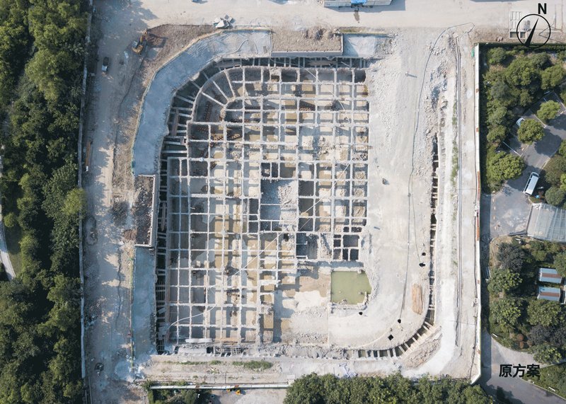 Aerial view of the gridded foundation layout on exposed earth during construction