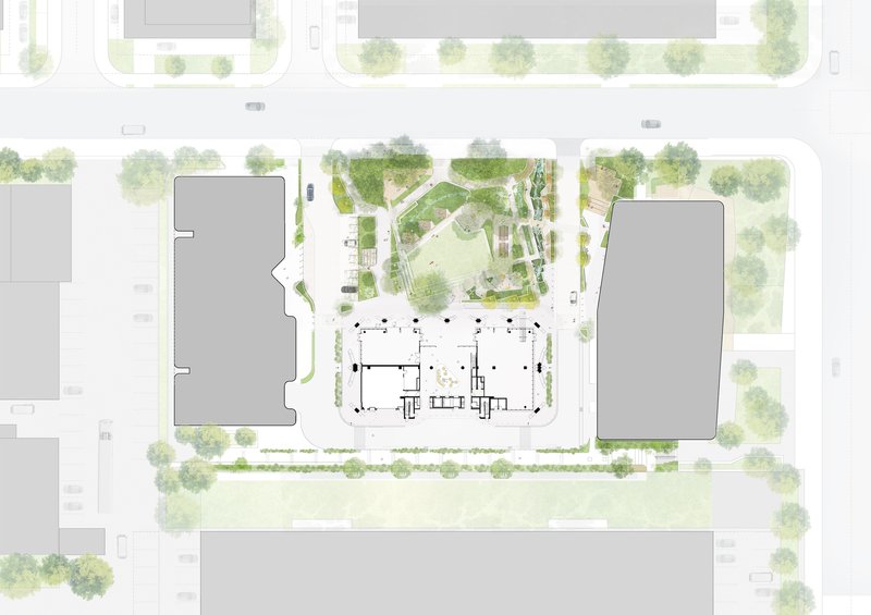 Site plan showing the ground floor footprint with diagonal pathways and landscaped zones between flanking buildings