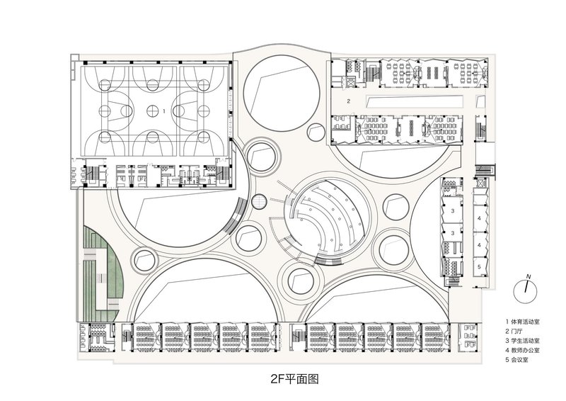 Second floor plan drawing showing the arrangement of circular voids and classroom wings around a central spiral