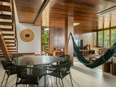 Estúdio Pedro Haruf Carves a Layered Timber House into a Steep Bahian Hillside