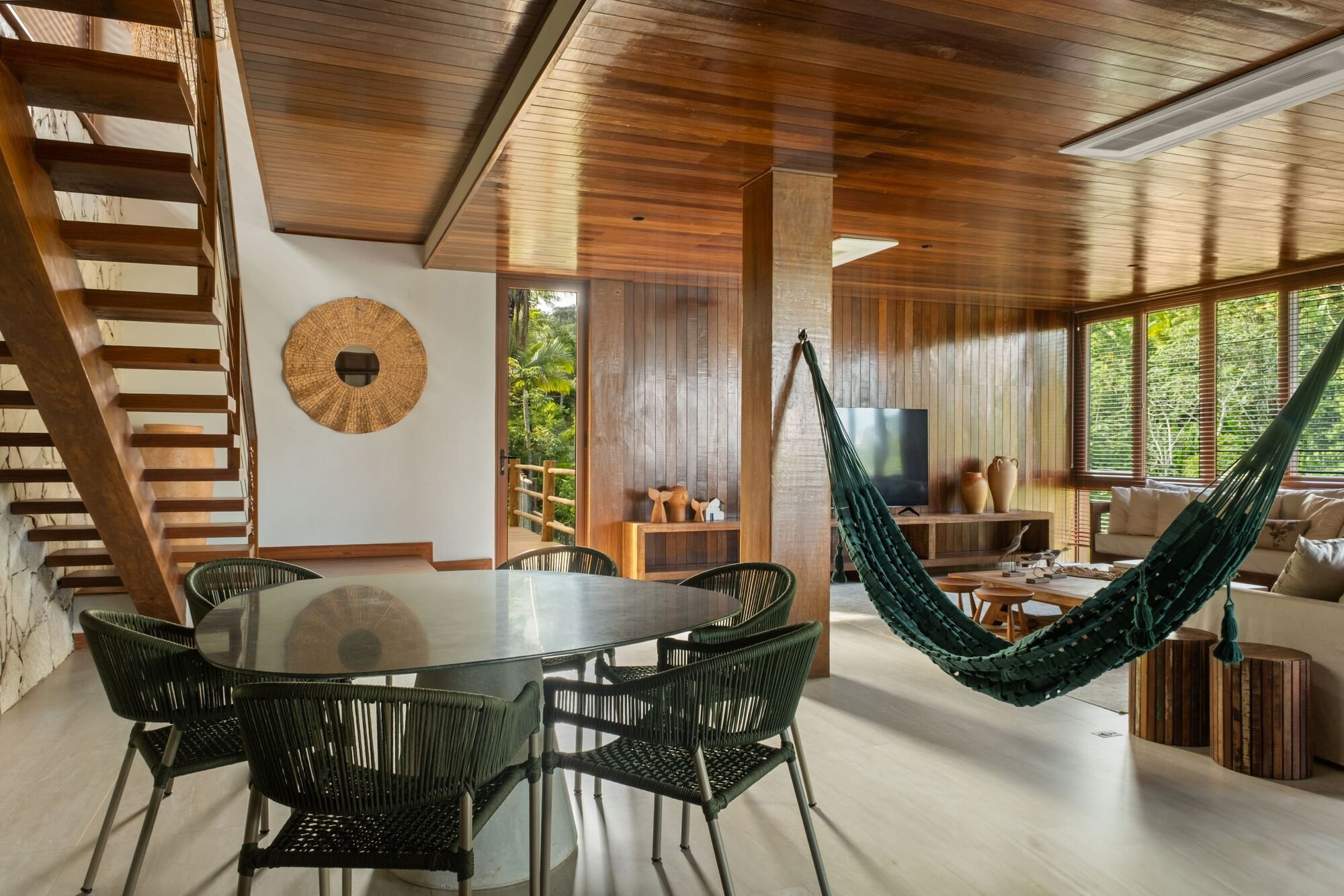 Estúdio Pedro Haruf Carves a Layered Timber House into a Steep Bahian Hillside