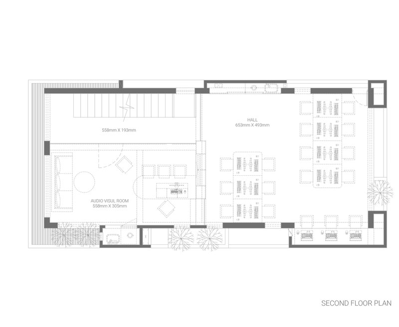 Second floor plan drawing showing audio visual room and hall with seating and spiral stairs