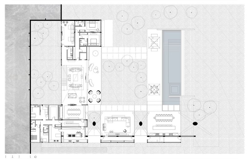 Floor plan drawing showing a linear arrangement of rooms with courtyard and pool