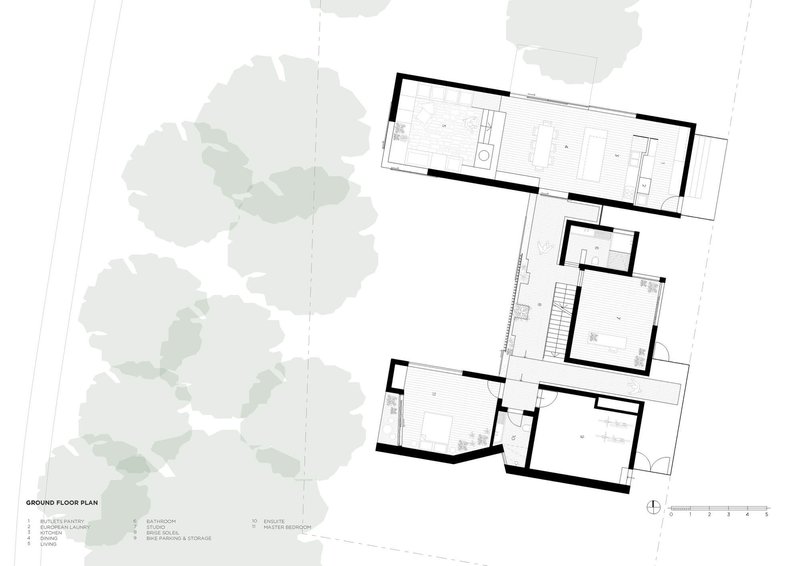 Ground floor plan drawing showing rectangular volumes arranged around a central staircase