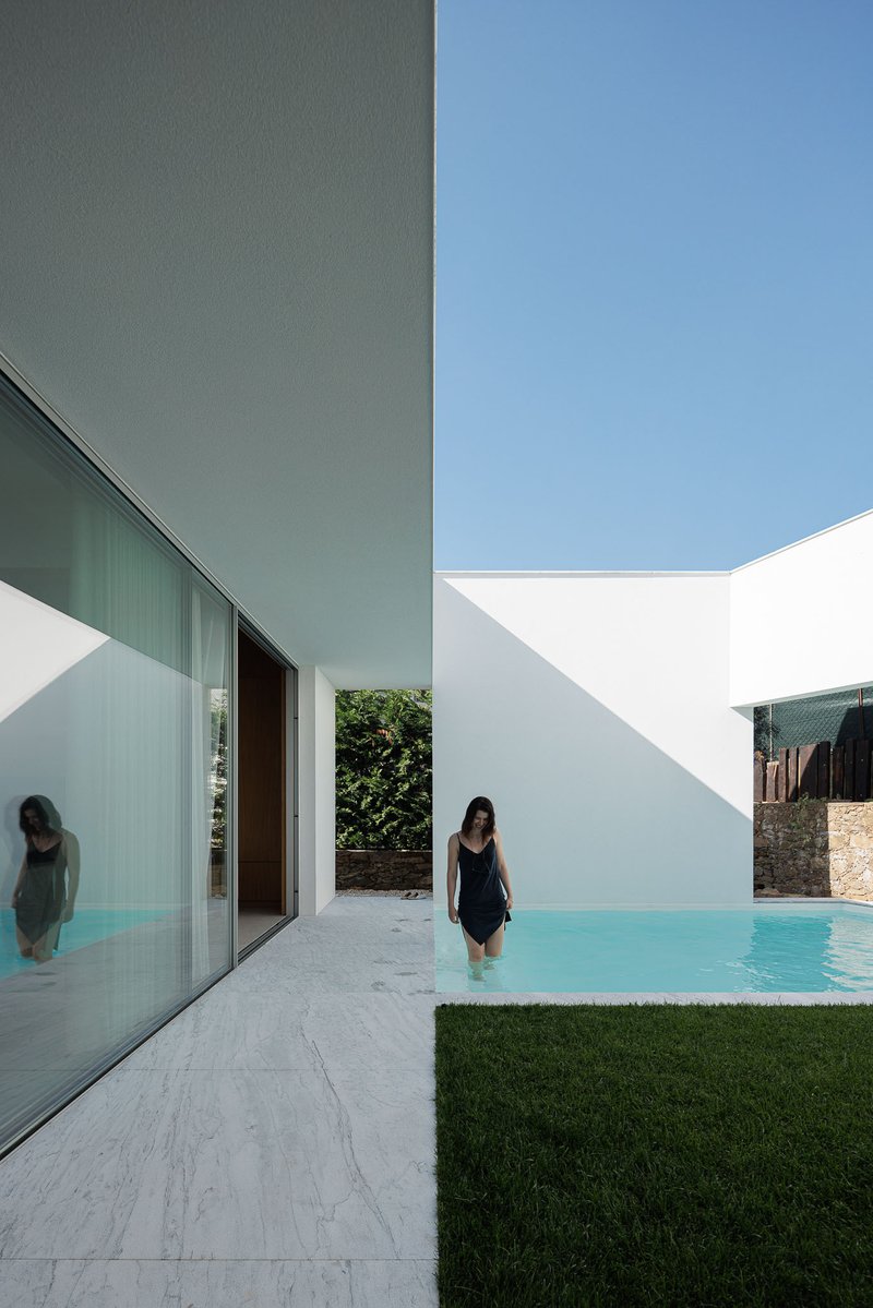 Pema Studio Carves a Fortress of Light from a Cramped Urban Plot in Santo Tirso