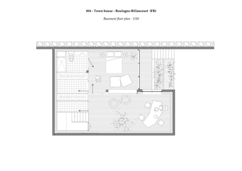 Basement floor plan drawing showing open living area with furniture layout and planted courtyard