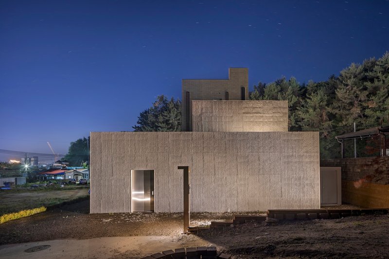 DRAWING WORKS Carves a Concrete Surf Retreat into a Korean Hillside Near the East Sea