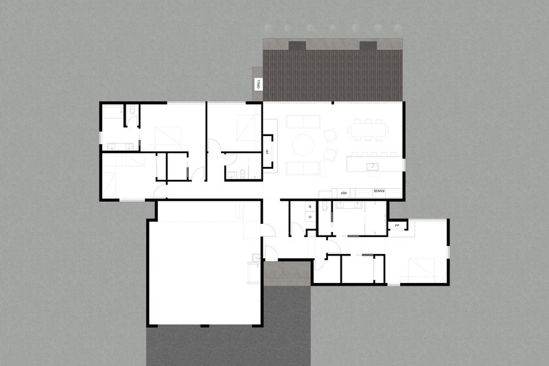 Floor plan drawing showing offset wing volumes with garage and living spaces