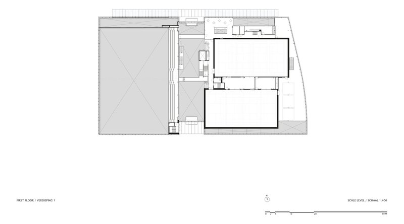 First floor plan drawing showing a large sports hall and smaller rectangular volume