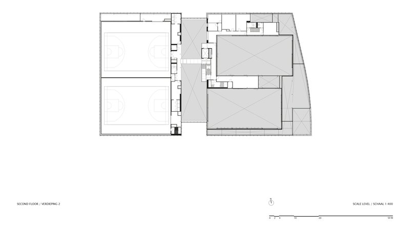 Second floor plan drawing showing two sports courts and a central circulation spine