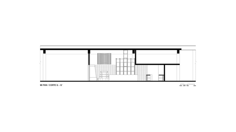 Section drawing depicting interior configuration with central staircase and lateral service zones