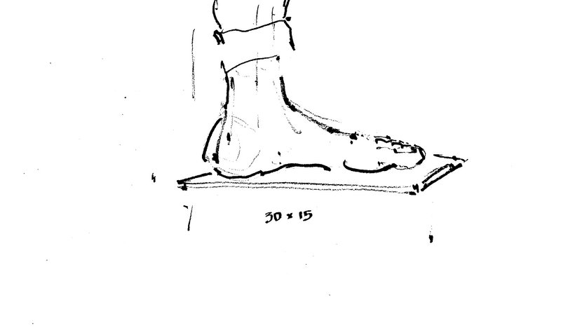 Freehand ink sketch of a seated figure with dimensional notation