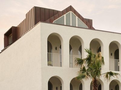 Common Office Wraps a Four-Storey Bondi Beach Villa in Arches, Brick, and Copper