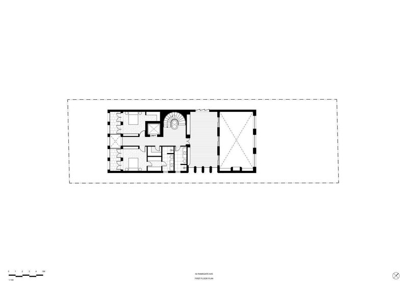First floor plan showing bedroom suite with oval stairwell and open living space