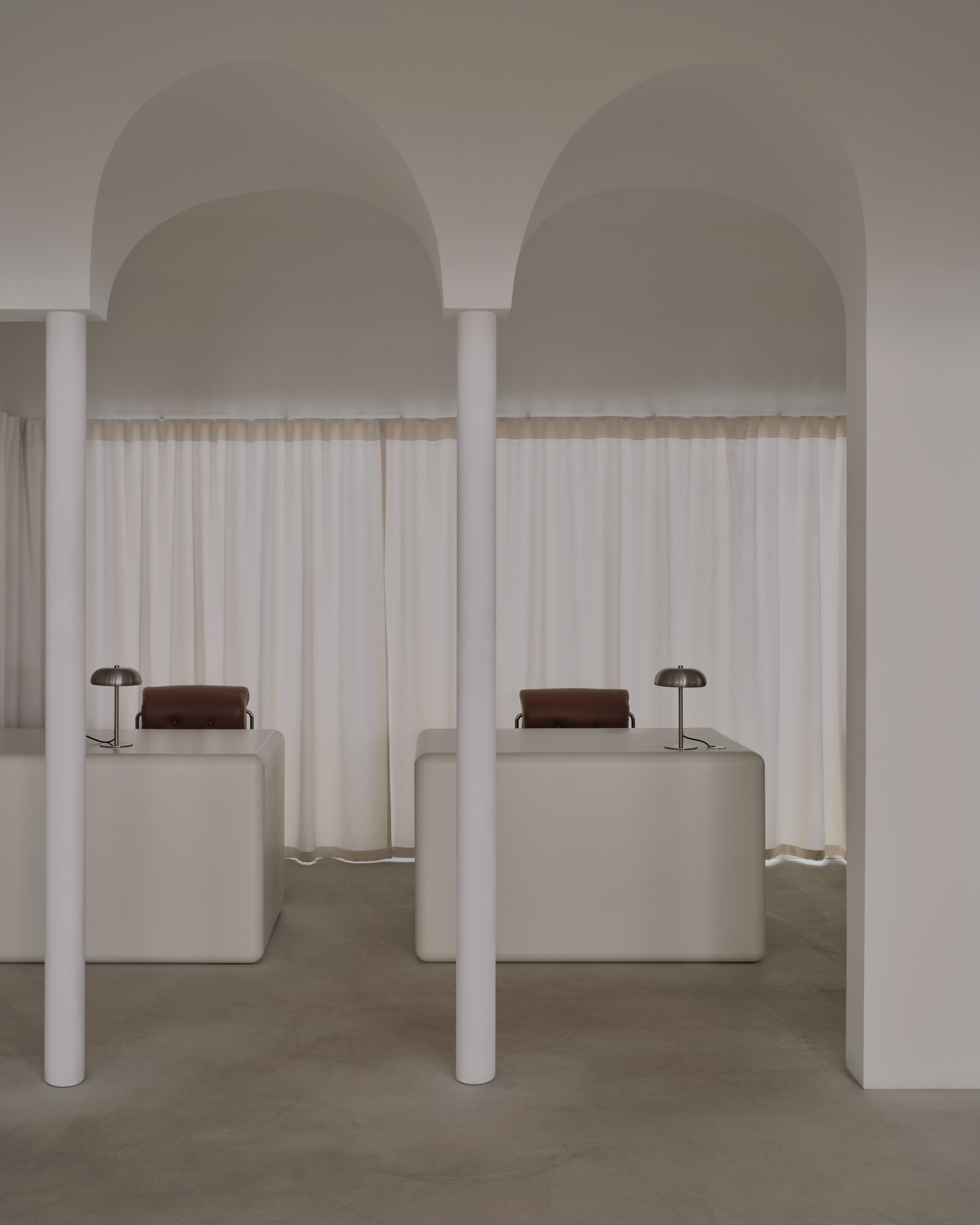 UP2DATE Architects Carve an Arched Sanctuary for Almaty Womenswear Brand Malli