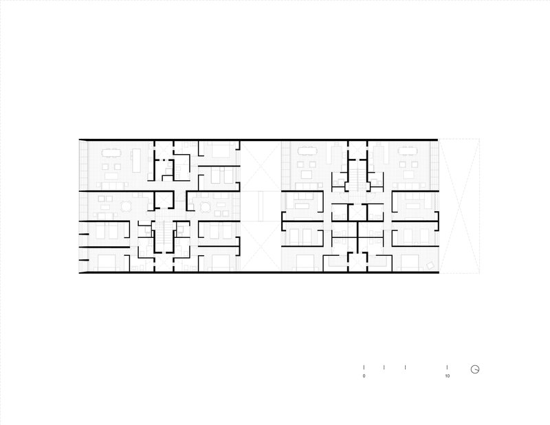 Floor plan drawing showing two residential blocks with mirrored units and central circulation cores