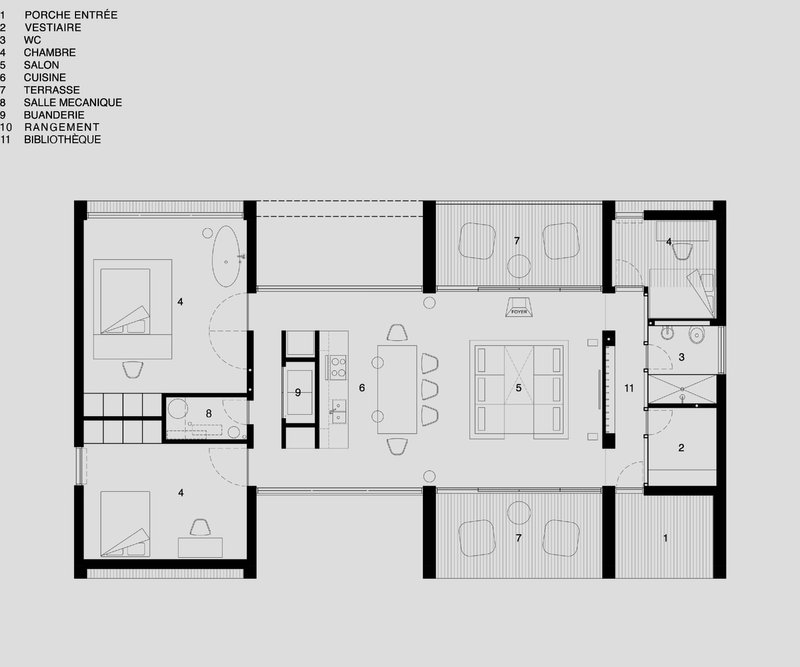 Floor plan drawing showing open living spaces with two terraces flanking a central salon and dining area