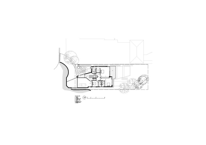 Ground floor plan showing a curved courtyard with pool alongside rectangular living spaces