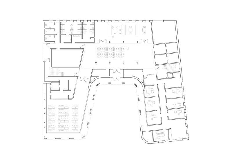 Ground floor plan drawing with curved central hall, seating rows, and flanking office spaces