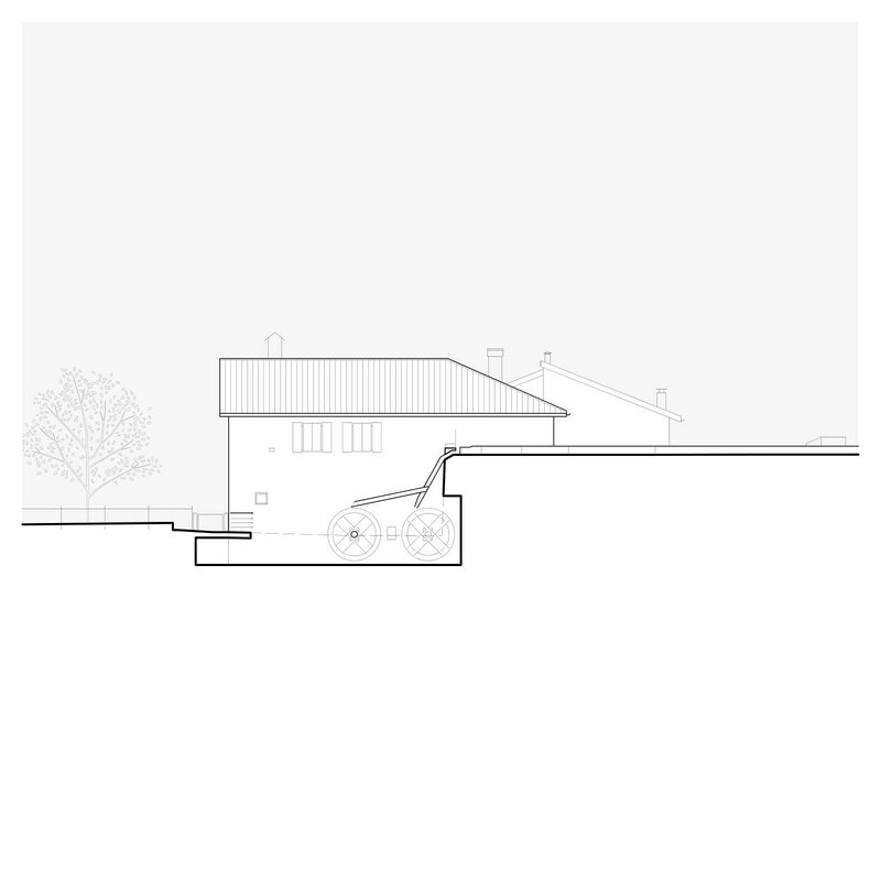 Section drawing showing the interior spaces with varying ceiling heights and mechanical plant below grade