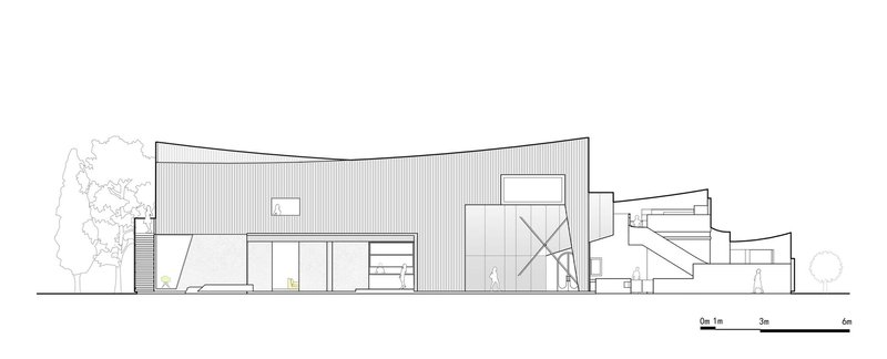 Elevation drawing showing facade with curved roof and stepped volumes flanked by trees