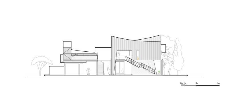 Elevation drawing showing horizontal volumes with curved roof and exposed diagonal stair structure