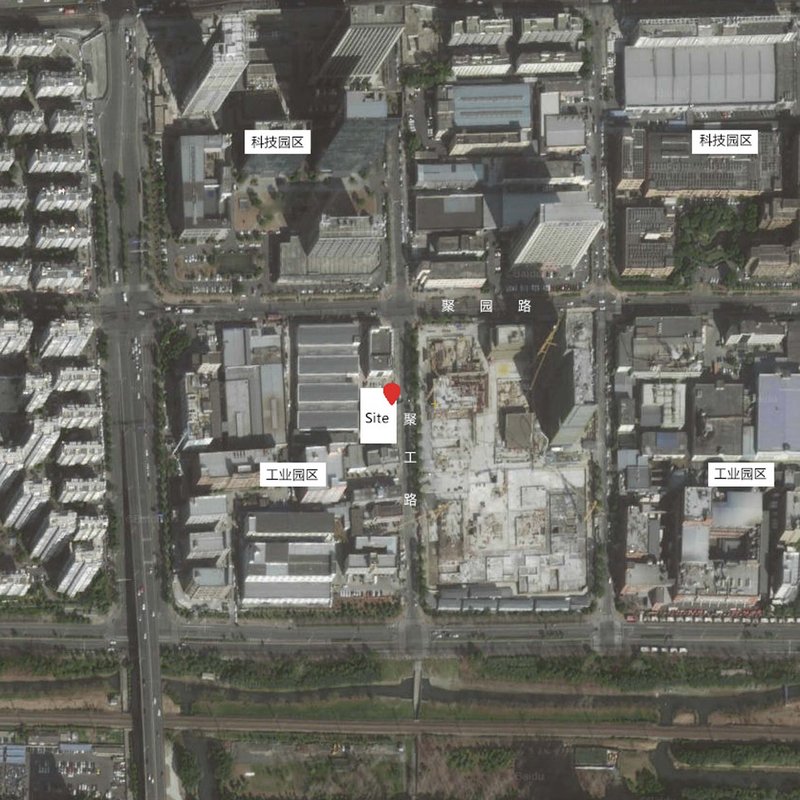 Aerial site plan showing the location marked with a red pin within a dense industrial district