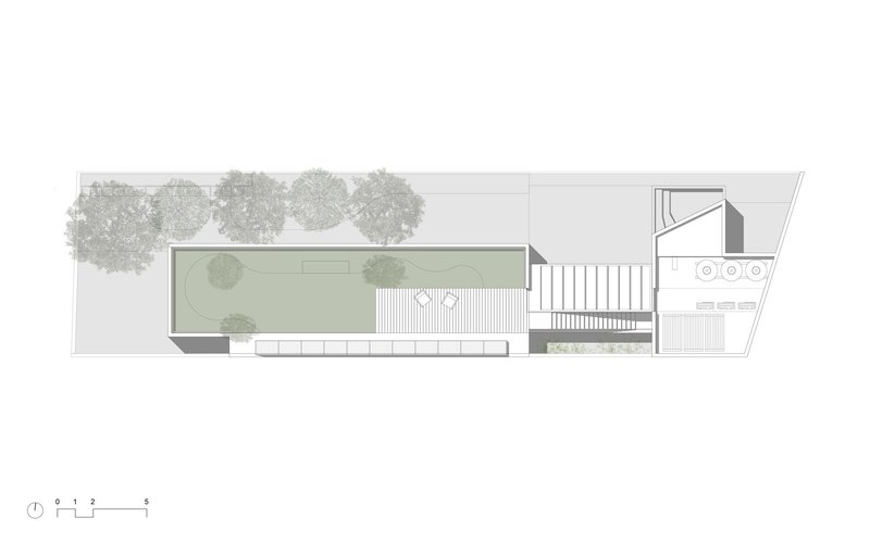 Ground floor plan drawing with linear garden courtyard flanked by pool and exterior stairs with street trees