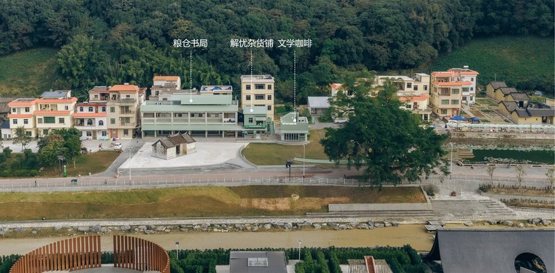 Atelier XÜK Wraps a Rural Chinese Village Center in Mint Green Corrugated Metal