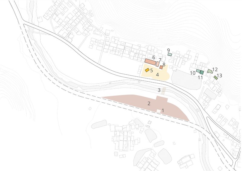 Site plan drawing showing numbered building clusters positioned between roadways with topographic terrain lines