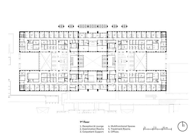 Floor plan drawing showing symmetrical wings with patient rooms flanking central circulation and service cores