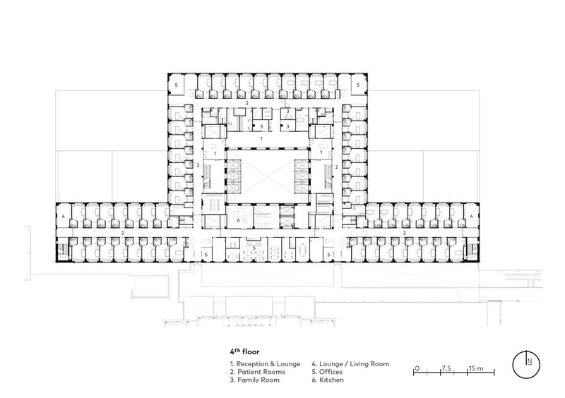Fourth floor plan showing repeating patient room units along corridors with central circulation zone