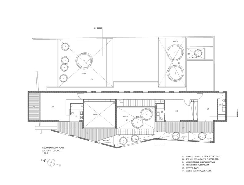 Second floor plan drawing showing an elongated structure with courtyards and angled stairs