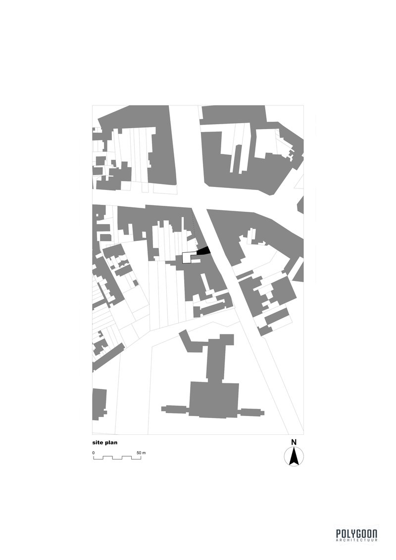 Site plan drawing showing building footprint and surrounding urban fabric with north arrow indicator