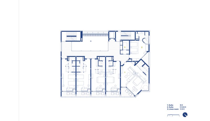 Floor plan drawing depicting four parallel rows of seating and an angled corner gathering space