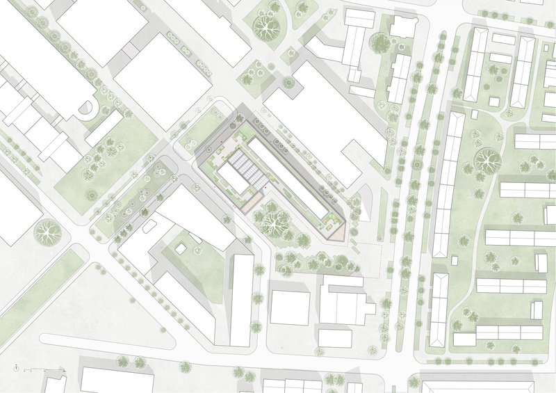 Site plan drawing showing angular building footprint surrounded by street trees and neighboring urban blocks