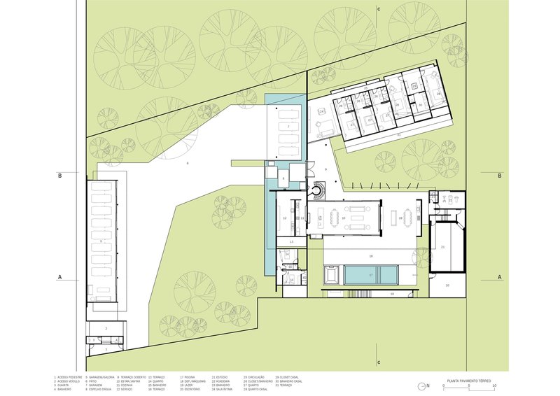 Site plan drawing showing L-shaped volumes organized around a central pool with landscaped surroundings