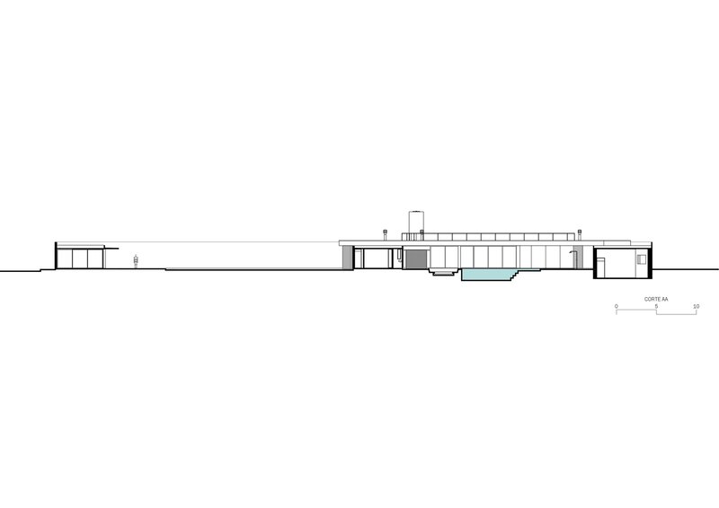Section drawing showing the low-slung horizontal profile with central courtyard and flanking pavilions