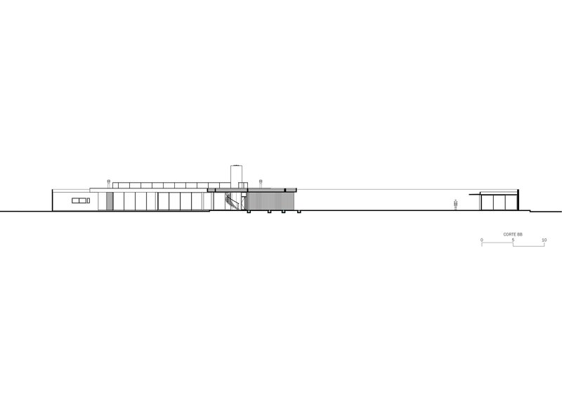 Section drawing revealing the interior spatial organization with double-height volumes and connecting circulation