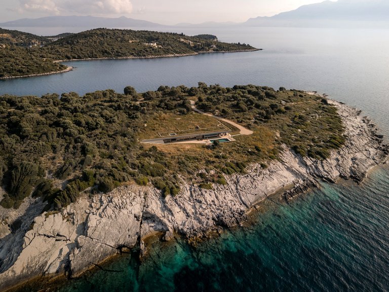 Ateno Architecture Studio Buries a Stone Residence into an Uninhabited Greek Peninsula