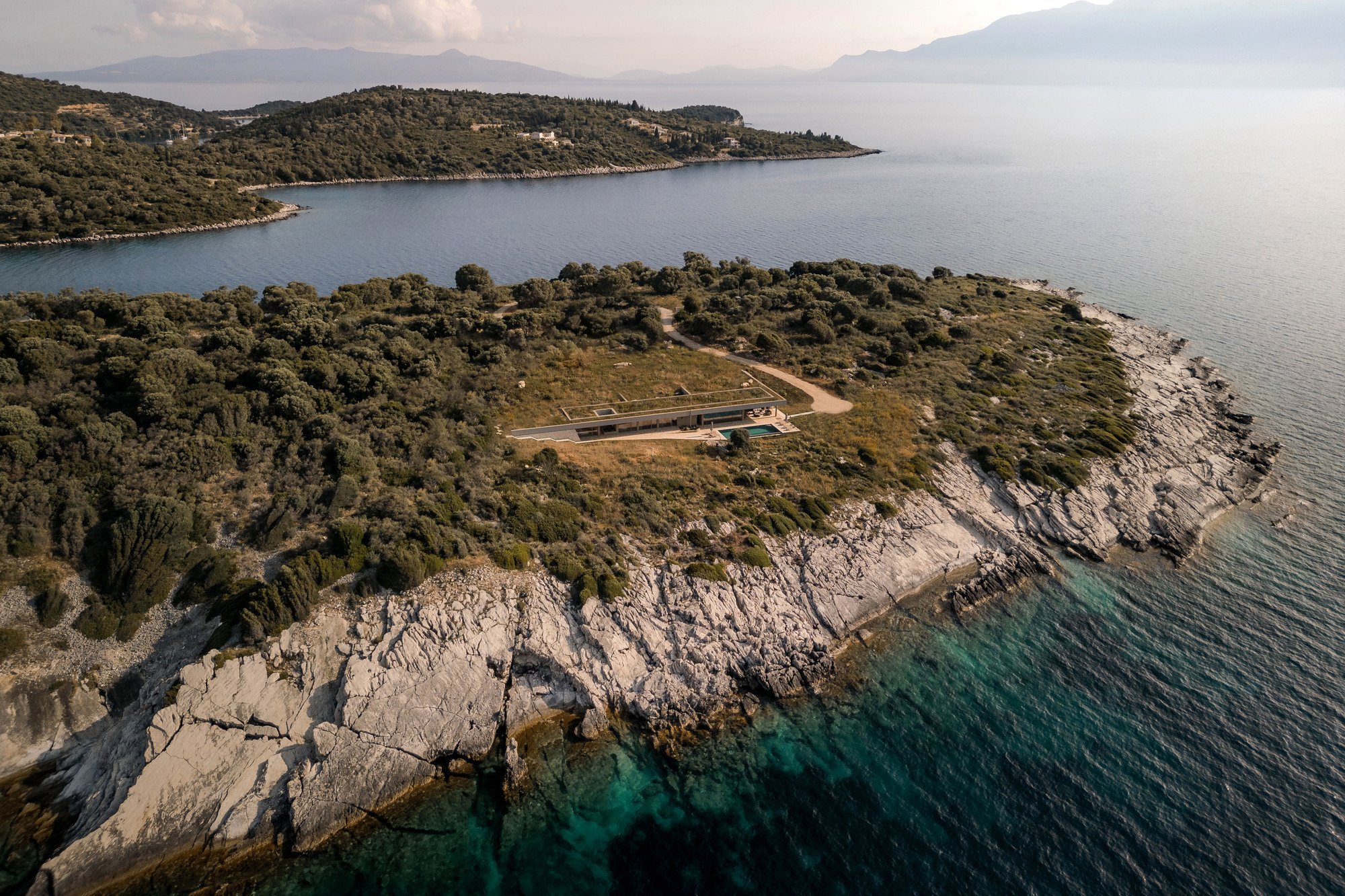 Ateno Architecture Studio Buries a Stone Residence into an Uninhabited Greek Peninsula