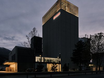 Three Firms Crown a 1978 Grain Silo in Tirol with Offices, Art, and a Biomass Power Plant