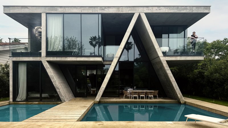 Next Office Folds a Concrete Gable into a Caspian Sea Villa That Doubles as Structure and Shelter