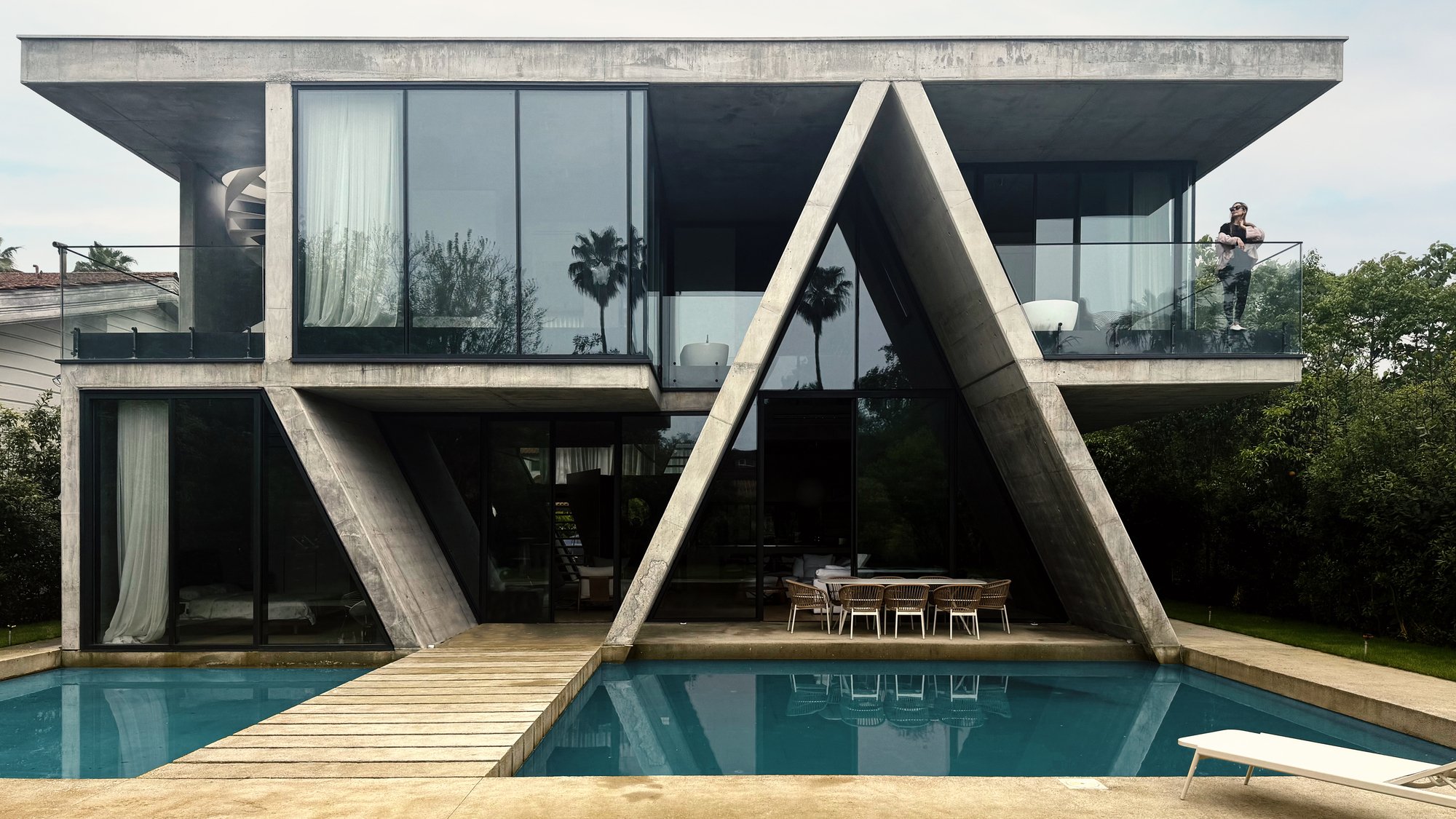 Next Office Folds a Concrete Gable into a Caspian Sea Villa That Doubles as Structure and Shelter