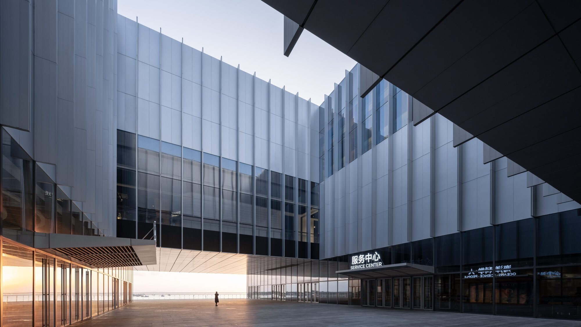 gmp Architects Plants a Metal-Clad Science Museum on the Edge of Jiaozhou Bay