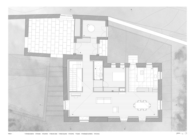 Floor plan drawing showing living and dining spaces with exterior stairs and terraces